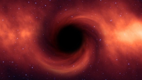 Draaiende zwarte gaten kunnen de voorkeur geven om samen te leunen
